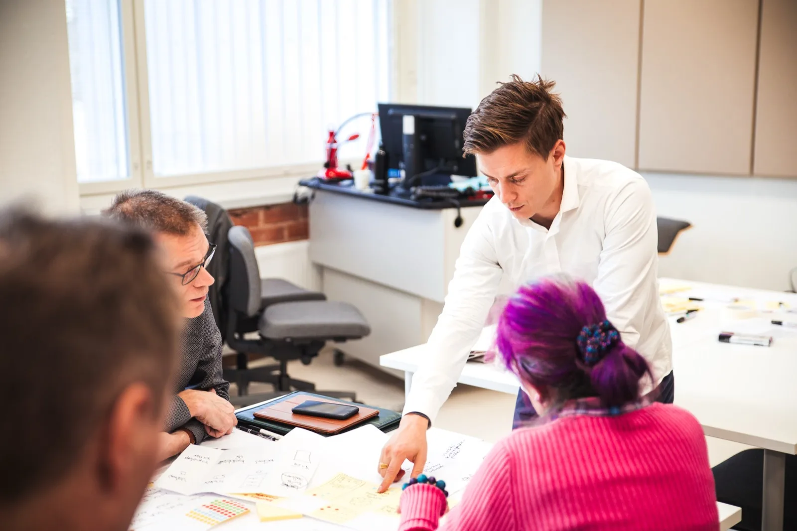 Vitali facilitating a design workshop with participants